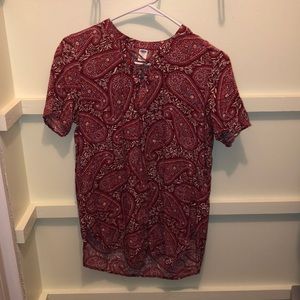 Red patterned blouse
